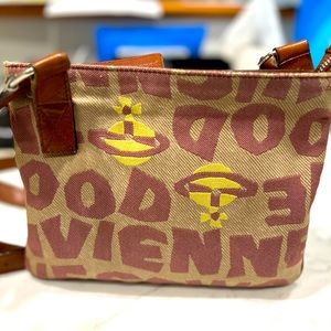 Vintage unique Vivienne Westwood Canvas with leather trim and strap cross body
